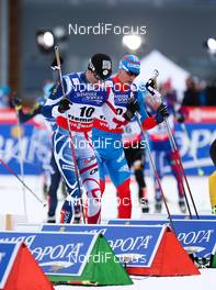 23.02.2013, Val di Fiemme, Italy (ITA):  (l-r) Maurice Manificat (FRA), Fischer, Swix, Rottefella, One Way and Evgeniy Belov (RUS), Fischer, Swix, Alpina, Rottefella, Adidas - FIS nordic world ski championships, cross-country, skiathlon men, Val di Fiemme (ITA). www.nordicfocus.com. © Laiho/NordicFocus. Every downloaded picture is fee-liable.
