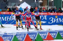 23.02.2013, Val di Fiemme, Italy (ITA): (l-r) Jens Filbrich (GER), Rossignol, One Way, Rottefella, Adidas, Eldar Roenning (NOR), Rorrignol, Swix, Rottefella and Hannes Dotzler (GER), Fischer, Swix, Alpina, Rottefella, Adidas  - FIS nordic world ski championships, cross-country, skiathlon men, Val di Fiemme (ITA). www.nordicfocus.com. © Laiho/NordicFocus. Every downloaded picture is fee-liable.