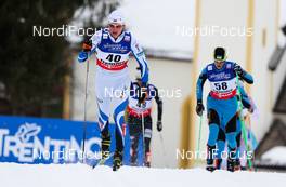 23.02.2013, Val di Fiemme, Italy (ITA): (l-r) Karel Tammjarv (EST), Fischer, Swix, Rottefella and Vitaliy Shtun (UKR)  - FIS nordic world ski championships, cross-country, skiathlon men, Val di Fiemme (ITA). www.nordicfocus.com. © Laiho/NordicFocus. Every downloaded picture is fee-liable.