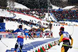 23.02.2013, Val di Fiemme, Italy (ITA): the top group leaves the stadium - FIS nordic world ski championships, cross-country, skiathlon men, Val di Fiemme (ITA). www.nordicfocus.com. © Felgenhauer/NordicFocus. Every downloaded picture is fee-liable.