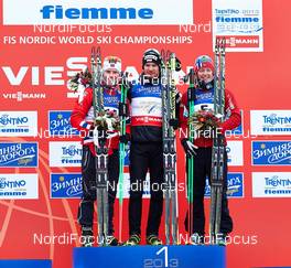 23.02.2013, Val di Fiemme, Italy (ITA): l-r: Martin Johnsrud Sundby (NOR), Dario Cologna (SUI), Sjur Roethe (NOR) - FIS nordic world ski championships, cross-country, skiathlon men, Val di Fiemme (ITA). www.nordicfocus.com. © Felgenhauer/NordicFocus. Every downloaded picture is fee-liable.