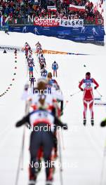23.02.2013, Val di Fiemme, Italy (ITA): the top group leaves the stadium - FIS nordic world ski championships, cross-country, skiathlon women, Val di Fiemme (ITA). www.nordicfocus.com. © Felgenhauer/NordicFocus. Every downloaded picture is fee-liable.