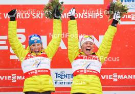24.02.2013, Val di Fiemme, Italy (ITA):  (l-r) Kikkan Randall (USA), Fischer, Swix, Salomon and Jessica Diggins (USA), Salomon, One Way - FIS nordic world ski championships, cross-country, team sprint, Val di Fiemme (ITA). www.nordicfocus.com. © Laiho/NordicFocus. Every downloaded picture is fee-liable.