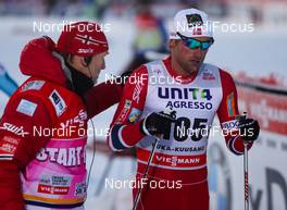30.11.2013, Kuusamo, Finland (FIN): (l-r) a norwegian trainer and Petter Northug (NOR), Fischer, Swix, Alpina, Rottefella - FIS world cup cross-country, 10km men, Kuusamo (FIN). www.nordicfocus.com. © Laiho/NordicFocus. Every downloaded picture is fee-liable.
