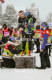 30.11.2013, Kuusamo, Finland (FIN): volunteers setting the transponders - FIS world cup cross-country, 5km women, Kuusamo (FIN). www.nordicfocus.com. © Laiho/NordicFocus. Every downloaded picture is fee-liable.