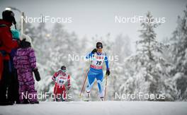 30.11.2013, Kuusamo, Finland (FIN): Marit Bjoergen (NOR), Riitta-Liisa Roponen (FIN), (l-r) - FIS world cup cross-country, 5km women, Kuusamo (FIN). www.nordicfocus.com. © Felgenhauer/NordicFocus. Every downloaded picture is fee-liable.