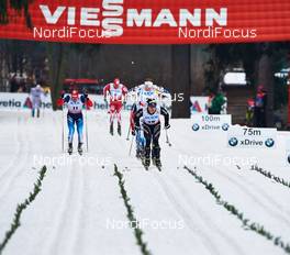 21.12.2013, Asiago, Italy (ITA): Anton Gafarov (RUS), Gianluca Cologna (SUI), (l-r) - FIS world cup cross-country, individual sprint, Asiago (ITA). www.nordicfocus.com. © Felgenhauer/NordicFocus. Every downloaded picture is fee-liable.
