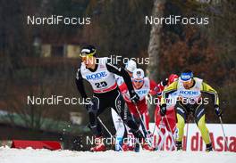 21.12.2013, Asiago, Italy (ITA): Mauro Gruber (SUI), Loris Frasnelli (ITA), (l-r) - FIS world cup cross-country, individual sprint, Asiago (ITA). www.nordicfocus.com. © Felgenhauer/NordicFocus. Every downloaded picture is fee-liable.