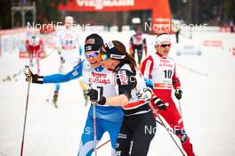 21.12.2013, Asiago, Italy (ITA): Anne Kylloenen (FIN), Justyna Kowalczyk (POL), (l-r) - FIS world cup cross-country, individual sprint, Asiago (ITA). www.nordicfocus.com. © Felgenhauer/NordicFocus. Every downloaded picture is fee-liable.