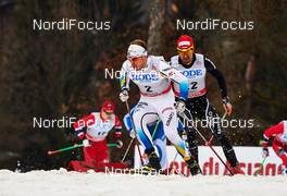 21.12.2013, Asiago, Italy (ITA): Emil Joensson (SWE), Ueli Schnider (SUI), (l-r) - FIS world cup cross-country, individual sprint, Asiago (ITA). www.nordicfocus.com. © Felgenhauer/NordicFocus. Every downloaded picture is fee-liable.