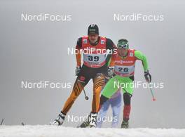 28.12.2013, Oberhof, Germany (GER): Franz Goering (GER), Sergei Dolidovich (BLR), (l-r) - FIS world cup cross-country, tour de ski, prologue men, Oberhof (GER). www.nordicfocus.com. © Felgenhauer/NordicFocus. Every downloaded picture is fee-liable.
