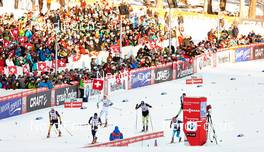 31.12.2013, Lenzerheide, Switzerland (SUI): Tim Tscharnke (GER), Simeon Hamilton (USA), (l-r), arrive at the finish line - FIS world cup cross-country, tour de ski, individual sprint, Lenzerheide (SUI). www.nordicfocus.com. © Felgenhauer/NordicFocus. Every downloaded picture is fee-liable.