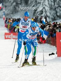 13.01.2013, Chaux-Neuve, France (FRA): Lukas Runggaldier (ITA), Fischer, Leki, Rottefella followed by Mattia Runggaldier (ITA), Fischer  - FIS world cup nordic combined, team sprint HS118/2x7.5km, Chaux-Neuve (FRA). www.nordicfocus.com. © Becker/NordicFocus. Every downloaded picture is fee-liable.