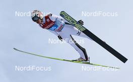 01.01.2013, Garmisch, Germany (GER):  Taku Takeuchi (JPN), Fischer - FIS world cup ski jumping, four hills tournament, individual HS140, Garmisch (GER). www.nordicfocus.com. © Laiho/NordicFocus. Every downloaded picture is fee-liable.