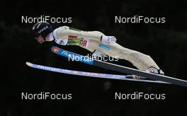 03.01.2013, Innsbruck, Austria (AUT): Anders Jacobsen (NOR), Fluege.de  - FIS world cup ski jumping, four hills tournament, individual HS130 qualification, Innsbruck (AUT). www.nordicfocus.com. © Laiho/NordicFocus. Every downloaded picture is fee-liable.