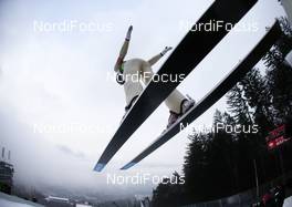 04.01.2013, Innsbruck, Austria (AUT): Anders Jacobsen (NOR), Fluege.de  - FIS world cup ski jumping, four hills tournament, individual HS130, Innsbruck (AUT). www.nordicfocus.com. © Laiho/NordicFocus. Every downloaded picture is fee-liable.