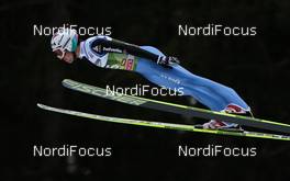 03.01.2013, Innsbruck, Austria (AUT):  Simon Ammann (SUI), Fischer - FIS world cup ski jumping, four hills tournament, individual HS130 qualification, Innsbruck (AUT). www.nordicfocus.com. © Laiho/NordicFocus. Every downloaded picture is fee-liable.