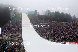 04.01.2013, Innsbruck, Austria (AUT):  foggy Bergisel hill and sold out stadium - FIS world cup ski jumping, four hills tournament, individual HS130, Innsbruck (AUT). www.nordicfocus.com. © Laiho/NordicFocus. Every downloaded picture is fee-liable.