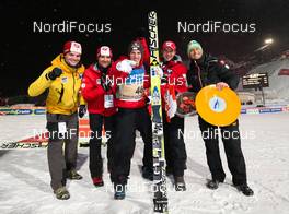 26.01.2013, Vikersund, Norway (NOR): the Austrian team celebrates Gregor Schlierenzauer´s 46th world cup victory  - FIS world cup ski flying, individual HS225, Vikersund (NOR). www.nordicfocus.com. © Laiho/NordicFocus. Every downloaded picture is fee-liable.