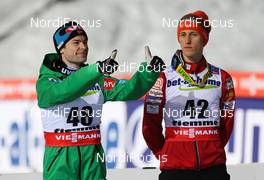28.02.2013, Val di Fiemme, Italy (ITA): (l-r) Anders Jacobsen (NOR), Fluege.de and Peter Prevc (SLO)  - FIS nordic world ski championships, ski jumping, individual HS134, Val di Fiemme (ITA). www.nordicfocus.com. © Laiho/NordicFocus. Every downloaded picture is fee-liable.