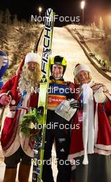 29.11.2013 Kuusamo, Finland (FIN): Marinus Kraus (GER) and Santa Claus - FIS world cup ski jumping, individual HS142, Kuusamo (FIN). www.nordicfocus.com. © Felgenhauer/NordicFocus. Every downloaded picture is fee-liable.