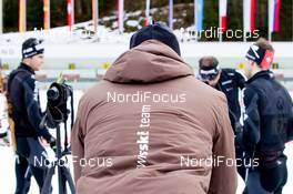 09.01.2014, Ruhpolding, Germany (GER): Joern Wollschlaeger (GER) coach Team Switzerland, Mario Dolder (SUI), Claudio Boeckli (SUI), Serafin Wiestner (SUI)  - IBU world cup biathlon, relay men, Ruhpolding (GER). www.nordicfocus.com. © Manzoni/NordicFocus. Every downloaded picture is fee-liable.