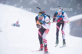 18.01.2014, Antholz, Italy (ITA): Christoph Sumann (AUT), Tobias Eberhard (AUT) - IBU world cup biathlon, pursuit men, Antholz (ITA). www.nordicfocus.com. © Manzoni/NordicFocus. Every downloaded picture is fee-liable.