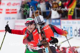18.01.2014, Antholz, Italy (ITA): Nadezhda Skardino (BLR), Andrea Henkel (GER) - IBU world cup biathlon, pursuit women, Antholz (ITA). www.nordicfocus.com. © Manzoni/NordicFocus. Every downloaded picture is fee-liable.