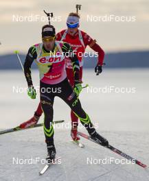 13.03.2014, Kontiolahti, Finland (FIN): Martin Fourcade (FRA), Rossignol, One Way, Rottefella followed by Johannes Thingnes Boe (NOR), Fischer, Rottefella, Swix, Odlo, Alpina - IBU world cup biathlon, sprint men, Kontiolahti (FIN). www.nordicfocus.com. © Laiho/NordicFocus. Every downloaded picture is fee-liable.