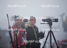 20.03.2014, Oslo, Norway (NOR): Klaus Siebert (GER) coach team Belarus, Darya Domracheva (BLR) - IBU world cup biathlon Holmenkollen, sprint women, Oslo (NOR). www.nordicfocus.com. © Manzoni/NordicFocus. Every downloaded picture is fee-liable.