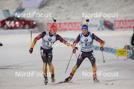 30.11.2014, Oestersund, Sweden (SWE):  Anais Bescond (FRA), Simon Schempp (GER) - IBU world cup biathlon, relay mixed, Oestersund (SWE). www.nordicfocus.com. © Manzoni/NordicFocus. Every downloaded picture is fee-liable.