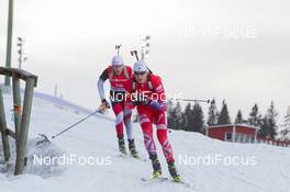 07.12.2014, Oestersund, Sweden (SWE):  Alexander Os (NOR), Simon Eder (AUT) - IBU world cup biathlon, pursuit men, Oestersund (SWE). www.nordicfocus.com. © Manzoni/NordicFocus. Every downloaded picture is fee-liable.