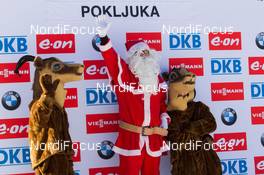 21.12.2014, Pokljuka, Slovenia (SLO): Event Feature: Santa Claus on the podium - IBU world cup biathlon, mass women, Pokljuka (SLO). www.nordicfocus.com. © Manzoni/NordicFocus. Every downloaded picture is fee-liable.