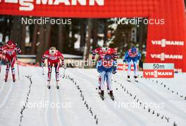 01.01.2014, Lenzerheide, Switzerland (SUI): Heidi Weng (NOR), Therese Johaug (NOR), Astrid Uhrenholdt Jacobsen (NOR), Kerttu Niskanen (FIN), (l-r) - FIS world cup cross-country, tour de ski, mass women, Lenzerheide (SUI). www.nordicfocus.com. © Felgenhauer/NordicFocus. Every downloaded picture is fee-liable.