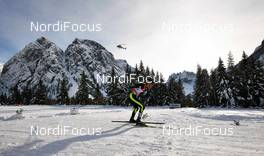 03.01.2014, Cortina-Toblach, Italy (ITA): Maurice Manificat (FRA) and a helicopter - FIS world cup cross-country, tour de ski, pursuit men, Cortina-Toblach (ITA). www.nordicfocus.com. © Felgenhauer/NordicFocus. Every downloaded picture is fee-liable.