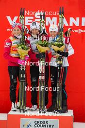 01.02.2014, Toblach, Italy (ITA): Therese Johaug (NOR), Marit Bjoergen (NOR), Charlotte Kalla (SWE) - FIS world cup cross-country, 10km women, Toblach (ITA). www.nordicfocus.com. © Manzoni/NordicFocus. Every downloaded picture is fee-liable.