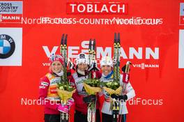 01.02.2014, Toblach, Italy (ITA): Therese Johaug (NOR), Marit Bjoergen (NOR), Charlotte Kalla (SWE) - FIS world cup cross-country, 10km women, Toblach (ITA). www.nordicfocus.com. © Manzoni/NordicFocus. Every downloaded picture is fee-liable.