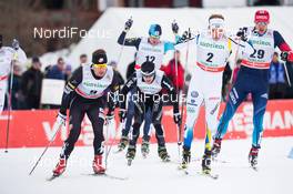 02.02.2014, Toblach, Italy (ITA): Emil Joensson (SWE), Joeri Kindschi (SUI) - FIS world cup cross-country, individual sprint, Toblach (ITA). www.nordicfocus.com. © Manzoni/NordicFocus. Every downloaded picture is fee-liable.