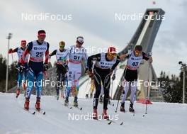 08.03.2014, Oslo, Norway (NOR): (l-r) Alexander Bessmertnykh (RUS), Madshus, Swix, Alpina, Rottefella, Adidas, Ueli Schnider (SUI) and Mathias Rundgreen (NOR) - FIS world cup cross-country, mass men, Oslo (NOR). www.nordicfocus.com. © Laiho/NordicFocus. Every downloaded picture is fee-liable.