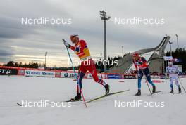 08.03.2014, Oslo, Norway (NOR): Martin Johnsrud Sundby (NOR), Fischer, KV+, Rottefella, Swix followed by Alexander Legkov (RUS), Rossignol, Swix, Rottefella, Adidas and Daniel Rickardsson (SWE), Fischer, One Way, Rottefella, Craft - FIS world cup cross-country, mass men, Oslo (NOR). www.nordicfocus.com. © Laiho/NordicFocus. Every downloaded picture is fee-liable.