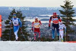 08.03.2014, Oslo, Norway (NOR): (l-r) Iivo Niskanen (FIN), Rossignol, Exel, Rottefella, Craft, Martin Johnsrud Sundby (NOR), Fischer, KV+, Rottefella, Swix and Alexander Legkov (RUS), Rossignol, Swix, Rottefella, Adidas - FIS world cup cross-country, mass men, Oslo (NOR). www.nordicfocus.com. © Laiho/NordicFocus. Every downloaded picture is fee-liable.