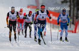 08.03.2014, Oslo, Norway (NOR): (l-r) Thomas Bing (GER), Rossignol, Swix, Rottefella, Adidas, Stanislav Volzhentsev (RUS), Madshus, Swix, Rottefella, Adidas and Lari Lehtonen (FIN), Fischer, One Way, Rottefella, Craft - FIS world cup cross-country, mass men, Oslo (NOR). www.nordicfocus.com. © Laiho/NordicFocus. Every downloaded picture is fee-liable.