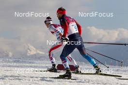 11.02.2014, Sochi, Russia (RUS): Cyril Miranda (FRA), Alexey Petukov (RUS) - XXII. Olympic Winter Games Sochi 2014, cross-country, individual sprint, Sochi (RUS). www.nordicfocus.com. © NordicFocus. Every downloaded picture is fee-liable.