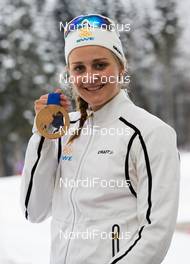 21.02.2014, Sochi, Russia (RUS): Stina Nilsson (SWE), Fischer, Swix, Alpina, Rottefella, Craft - XXII. Olympic Winter Games Sochi 2014, cross-country, medals, Sochi (RUS). www.nordicfocus.com. © NordicFocus. Every downloaded picture is fee-liable.