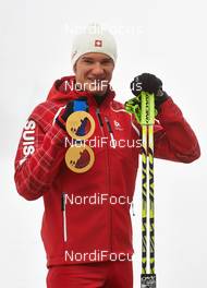 17.02.2014, Sochi, Russia (RUS): Dario Cologna (SUI) - XXII. Olympic Winter Games Sochi 2014, cross-country, medals, Sochi (RUS). www.nordicfocus.com. © NordicFocus. Every downloaded picture is fee-liable.