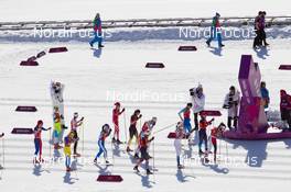 15.02.2014, Sochi, Russia (RUS): Event Feature:  The field sets up for the start - XXII. Olympic Winter Games Sochi 2014, cross-country, 4x5km women, Sochi (RUS). www.nordicfocus.com. © NordicFocus. Every downloaded picture is fee-liable.