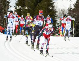 09.02.2014, Sochi, Russia (RUS): Sergey Mikayelyan (ARM), Erik Bjornsen (USA), Sjur Roethe (NOR), Martin Bajcicak (SVK), (l-r) - XXII. Olympic Winter Games Sochi 2014, cross-country, skiathlon men, Sochi (RUS). www.nordicfocus.com. © NordicFocus. Every downloaded picture is fee-liable.