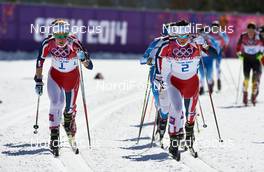 08.02.2014, Sochi, Russia (RUS): Therese Johaug (NOR), Marit Bjoergen (NOR), (l-r) - XXII. Olympic Winter Games Sochi 2014, cross-country, skiathlon women, Sochi (RUS). www.nordicfocus.com. © NordicFocus. Every downloaded picture is fee-liable.
