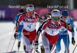 08.02.2014, Sochi, Russia (RUS): Heidi Weng (NOR), Therese Johaug (NOR), (l-r) - XXII. Olympic Winter Games Sochi 2014, cross-country, skiathlon women, Sochi (RUS). www.nordicfocus.com. © NordicFocus. Every downloaded picture is fee-liable.