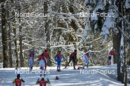 19.02.2014, Sochi, Russia (RUS): a group of athletes in the woods - XXII. Olympic Winter Games Sochi 2014, cross-country, team sprint, Sochi (RUS). www.nordicfocus.com. © NordicFocus. Every downloaded picture is fee-liable.
